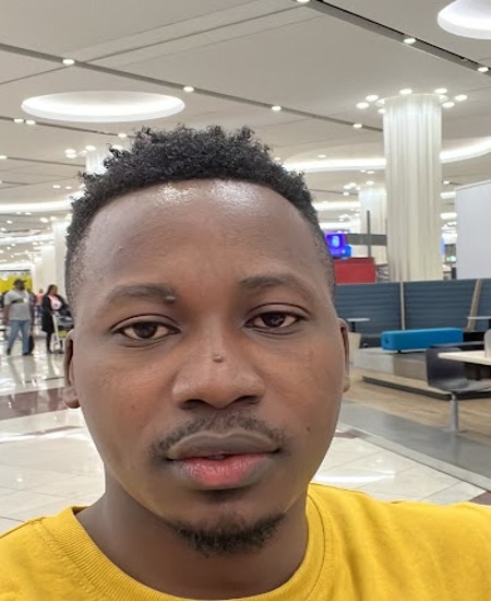 Passport-style photo of Muyingo Alex